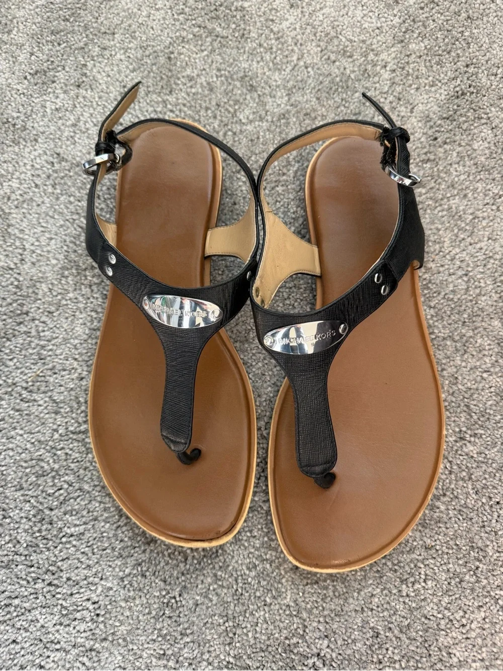 Michael Kors Black T-Strap Sandals with Silver Logo Plate